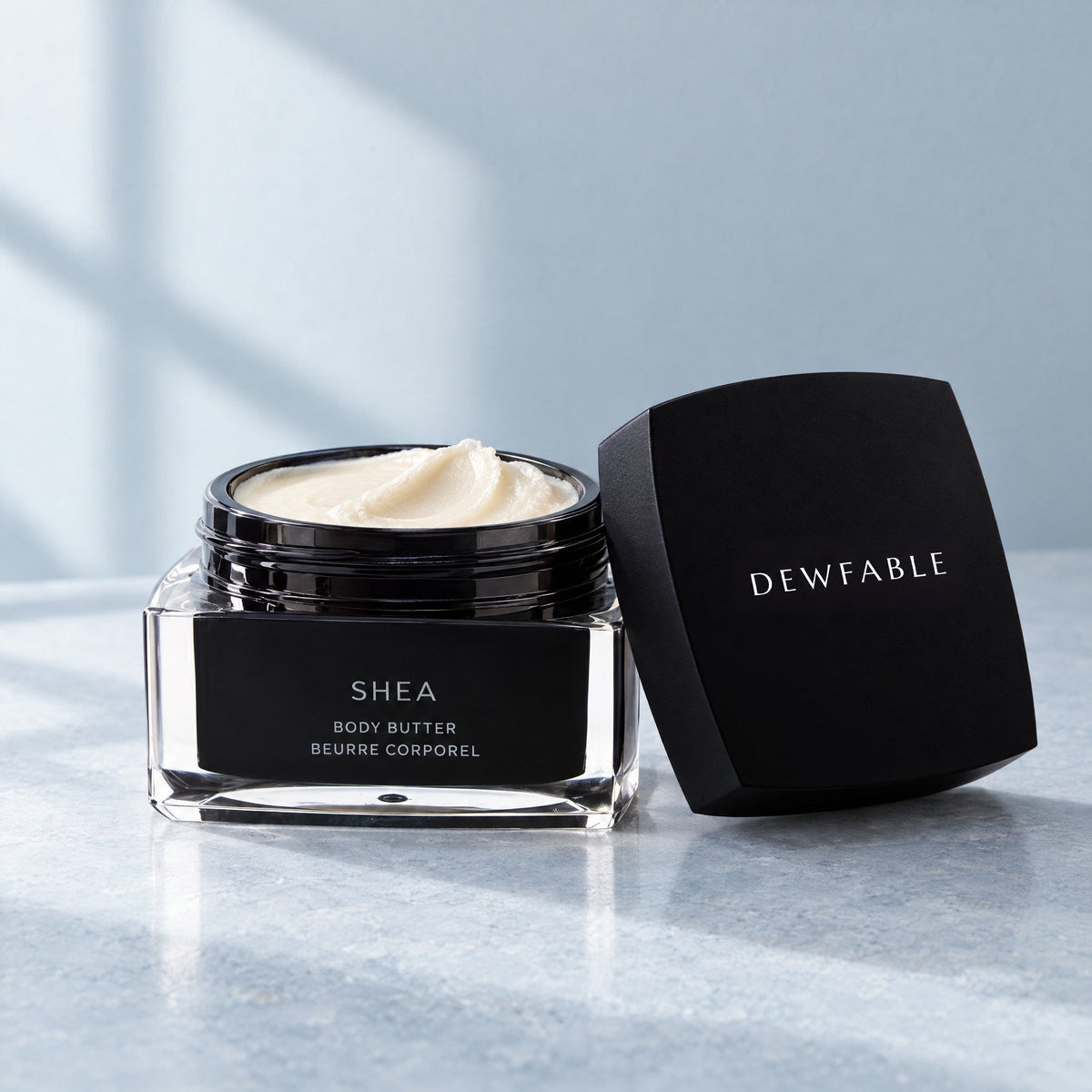 Open jar of Shea Body Butter