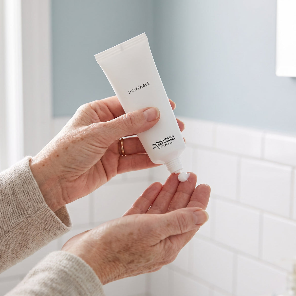 Squeezing Soothing Emulsion onto the fingertips