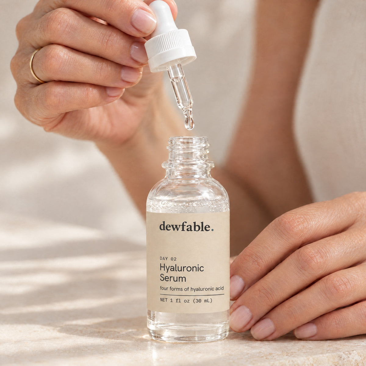 dewfable. Hyaluronic Serum, dropper with a drop of serum