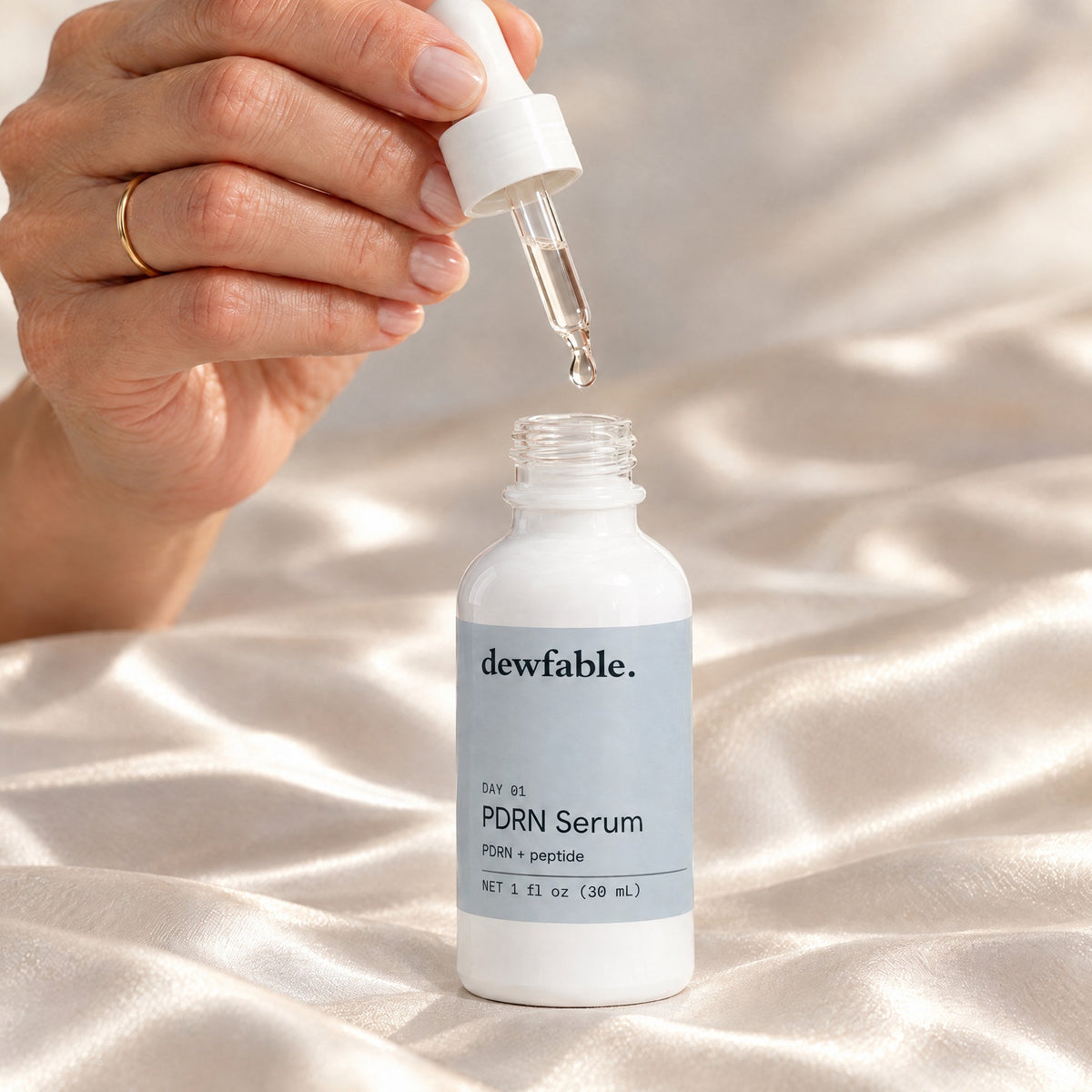 dewfable. PDRN Serum, dropper with a drop of serum